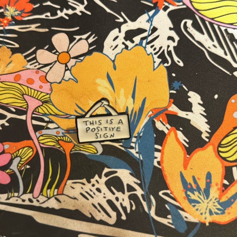 Positive sign enamel pin